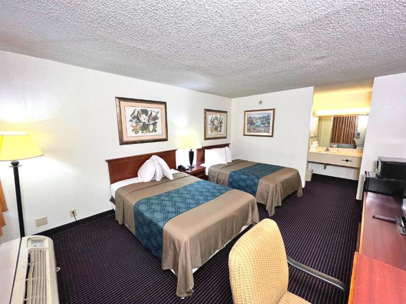 Heritage Inn And Suites Inniswold Buitenkant foto